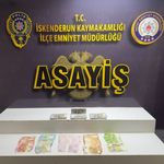 Hatay'da sahte dolarla dolandırıcılık yaptığı iddia edilen 3 zanlı tutuklandı