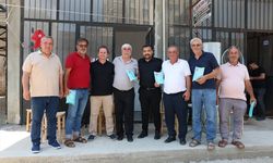Gülnar'da Babalar Günü dolayısıyla esnafa kravat hediye edildi