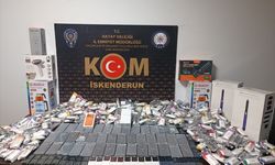 Hatay'da otomobilin LPG tankı ve tavan döşemesinde kaçak ürünler bulundu