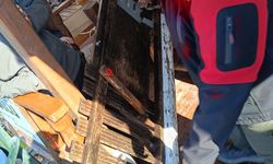 Antalya'da nehirde ceset sanılan nesne ev kapısı çıktı