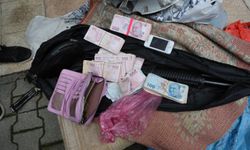 Mersin'de çöp biriktirilen evden ruhsatsız silah ve 115 bin lira çıktı