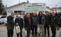 Korkuteli ilçesinde Orman Haftası'nda fidanlar toprakla buluşturuldu