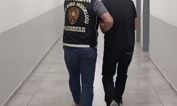 Antalya'da dolandırıcılık şüphelisi bankada para çekerken yakalandı