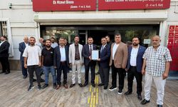 MHP Başkanı Halil Tetik, Ecz. Osman Mutlu’yu kutladı