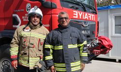 İtfaiyeci baba oğul alevlere birlikte göğüs geriyor