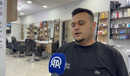 Isparta'da berber dükkanının taşlandığı anlar güvenlik kamerasında