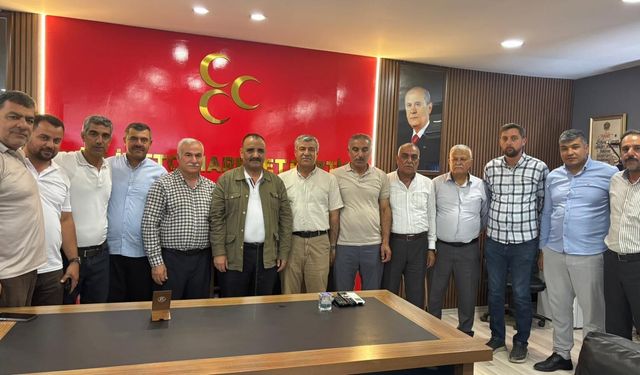 Muhtarlardan MHP Ceylanpınar İlçe Başkanlığına ziyaret