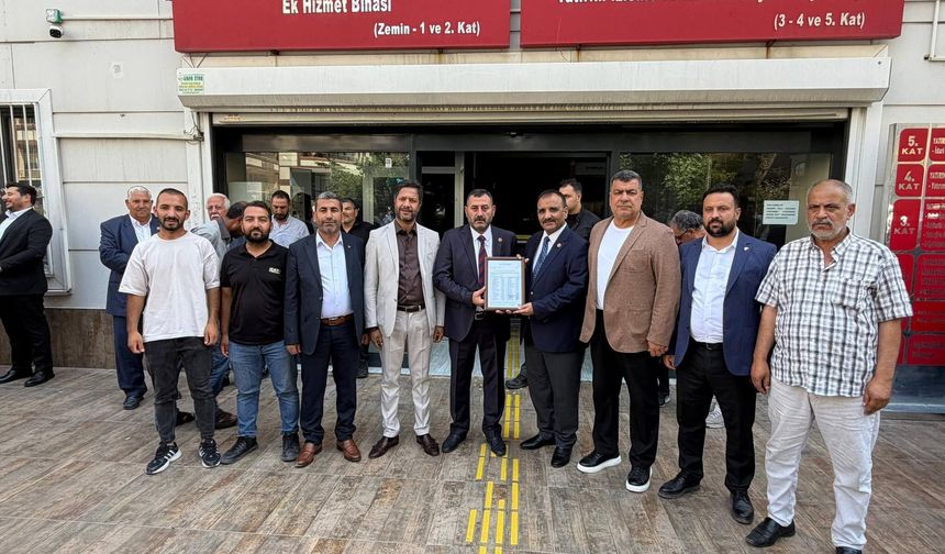 MHP Başkanı Halil Tetik, Ecz. Osman Mutlu’yu kutladı