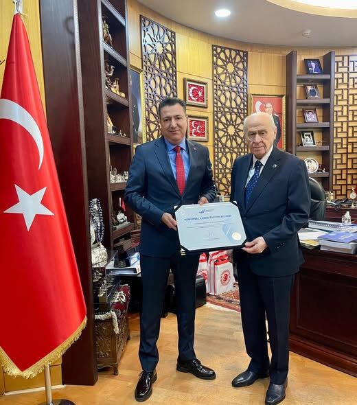 Okü’den Bahçeli’ye Akreditasyon Ziyareti