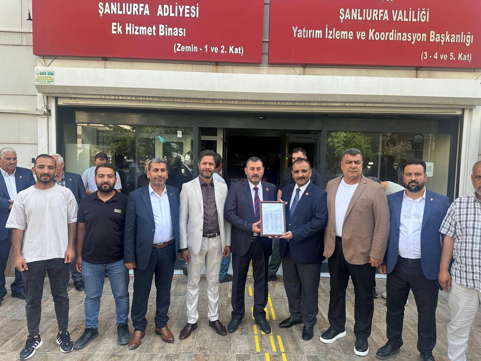 MHP Başkanı Halil Tetik, Ecz. Osman Mutlu’yu kutladı